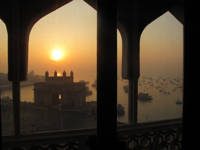 Sun rising over the India Gate as viewed from the Taj 20120107-185609.jpg